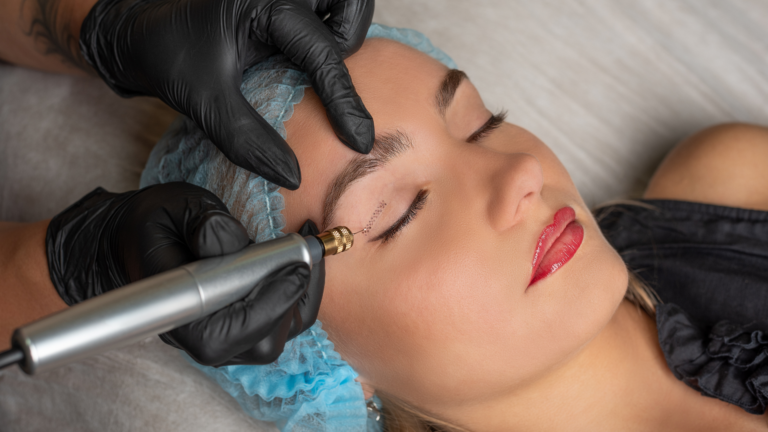 Close-up of a plasma pen treatment being performed on a patient's eyelid by a professional wearing black gloves.